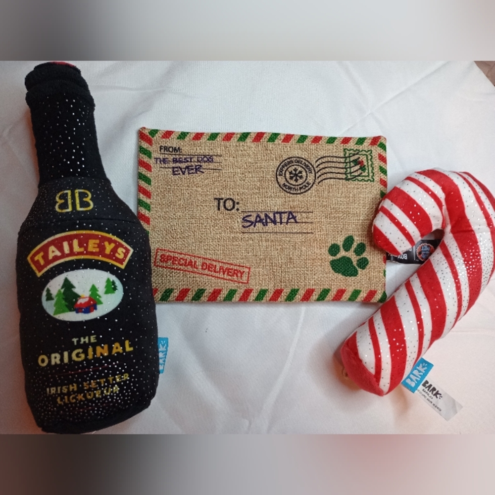 Christmas dog toys lot of 3  crackle Christmas letter, squeaky candy cane,.....